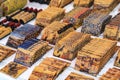 Souvenir magnets made with cork wood and ornate Portuguese azulejo pattern on display at a shop in Porto Portugal