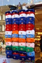 Souvenir multicolored hats with Soviet symbols in Moscow