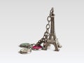 Souvenir from Paris in the form of the Eiffel tower on a chain Royalty Free Stock Photo