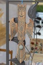 Souvenir phoenix bird made of wood on the feast day of the city Royalty Free Stock Photo