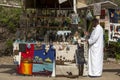 A souvenir seller stands next to his stall at the ancient Egyptian capital of Memphis in northern Egypt.