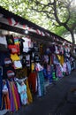 Souvenir shirts are for sale on at the souvenir market in Pura Tirta Empul, Bali