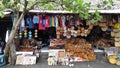 Souvenir shirts are for sale on at the souvenir market in Pura Tirta Empul, Bali