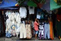 Souvenir shirts are for sale on at the souvenir market in Pura Tirta Empul, Bali