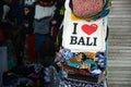 Souvenir shirts are for sale on at the souvenir market in Pura Tirta Empul, Bali
