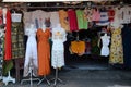 Souvenir shirts are for sale on at the souvenir market in Pura Tirta Empul, Bali