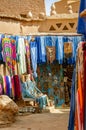 Souvenir shop and chilabas at the Kasbah Ait Ben Haddou in Ouarzazate, Morocco October 2019 Royalty Free Stock Photo