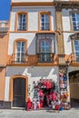 Souvenir shop in a colorful historic house in Sevilla