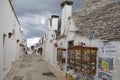 Souvenir shops in the trulli at Alberobello in Monti rione, Apulia, Italy