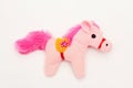 Souvenir soft pony horse on a white background. Royalty Free Stock Photo