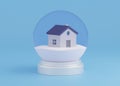 A souvenir Transparent Snow Globe with house inside