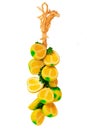 Souvenirs from Sicily. A decorative lemon braid made from the finest Sicilian ceramics, isolated on white. Others include oranges Royalty Free Stock Photo