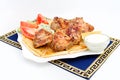 Souvlaki, kebab, grilled meat on pita bread with Royalty Free Stock Photo