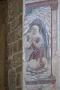 SOVANA, TUSCANY, ITALY - JUNE 16, 2019 - Ancient artwork, penitence, in the Concattedrale dei Santi Pietro e Paolo aka
