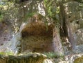 SOVANA, TUSCANY, ITALY - JUNE 16, 2019 - Ancient tomb remains carved into volcanic tuff rock at the Etruscan Necropolis