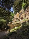 SOVANA, TUSCANY, ITALY - JUNE 16, 2019 - Ancient tomb remains carved into volcanic tuff rock at the Etruscan Necropolis