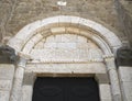 SOVANA, TUSCANY, ITALY - JUNE 16, 2019 - Entrance to the Concattedrale dei Santi Pietro e Paolo aka Duomo Cathedral of