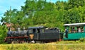 SOVATA, ROMANIA - Aug 14, 2019: The narrow gauge train with tourists from Sovata resort - Romania