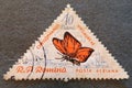 SOVATA, ROMANIA - Jul 02, 2020: Old Romania Canceled Triangle Postage Stamp circa 1960 shows butterfly Chrisophanus Virgaureae