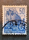 SOVATA, ROMANIA - Jul 02, 2020: old German stamp from 1957 with the image of a ship Royalty Free Stock Photo