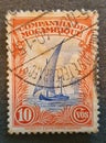 SOVATA, ROMANIA - Jul 02, 2020: Old postage stamp from Mozambique circa 1937 shows a sailing boat