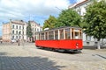 SOVETSK, RUSSIA. Monument to the Tilsit Tram against the background of a historic building