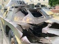 Broken Russian BTR in Kiev. Traces of explosion of military equipment. Ukraine. War, Russia and Ukraine. Soviet amphibious armored