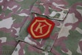 Soviet Army Commandant shoulder patch on camouflage uniform background
