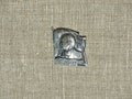 Soviet badge depicting Vladimir Ilyich Lenin Ulyanov with the inscription in Russian `Lenin` from the collections