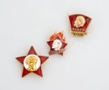 Soviet badges of oktyabryonok, pioneer and komsomol