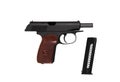 Soviet classic semi-automatic 9mm pistol. Police and military weapons. Black PM pistol with brown grip isolate on white back