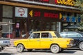 Soviet era old car in the street in Bishkek, the capital city of Kyrgyzstan