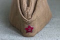 Soviet garrison cap with a red star with a hammer and sickle Royalty Free Stock Photo