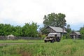 Soviet GAZ-69 car rides on a rural street in the Altai territory of Russia