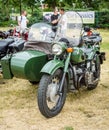 Soviet heavy motorcycle with a sidecar IMZ-Ural. Royalty Free Stock Photo