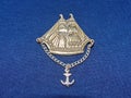 Soviet metal badge of a Caravel with a chain and anchor from the series `sailboats of the world`. Faleristics.