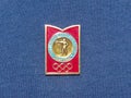 Soviet metal badge featuring the shooters and with the inscription in Russian `Moscow 80, Olympic games`