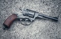 Soviet metal pistol revolver revolver with a drum on a concrete background