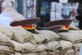 Soviet military caps on sandbags