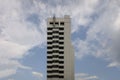 Soviet office building built in 1969 with cloudy blue sky on background.