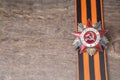 The Soviet order of the Second World war and George ribbon Victory Day 9 May postcard concept Royalty Free Stock Photo