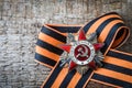 The Soviet order of the Second World war and George ribbon Victory Day 9 May postcard concept Royalty Free Stock Photo