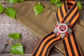 The Soviet order of the Second World war and George ribbon Victory Day 9 May postcard concept Royalty Free Stock Photo