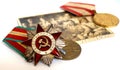 Soviet orders and medals lie on an old military photograph Royalty Free Stock Photo