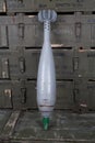 Soviet or russian 120 mm mortar shell on army green crate. Text in russian - type of ammunition, projectile caliber, projectile