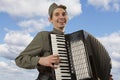 Soviet soldier playing the accordion Royalty Free Stock Photo