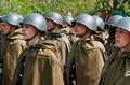 Soviet soldiers in helmets and cloaks