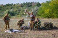 Soviet soldiers shoot in the sky celebrating victory in the battle with the Mujahideen