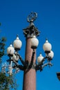 Soviet symbol over a street lamp, a star and hammer crossed with a sickle Royalty Free Stock Photo