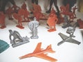 Soviet toy plastic red and gray tin soldiers and airplanes. Children`s toys of the USSR Royalty Free Stock Photo